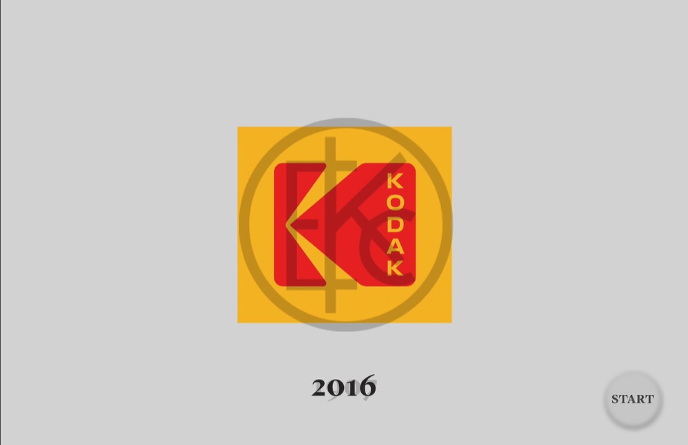 Kodak kiosk start screen, the logo mid-change between versions, with a Start button